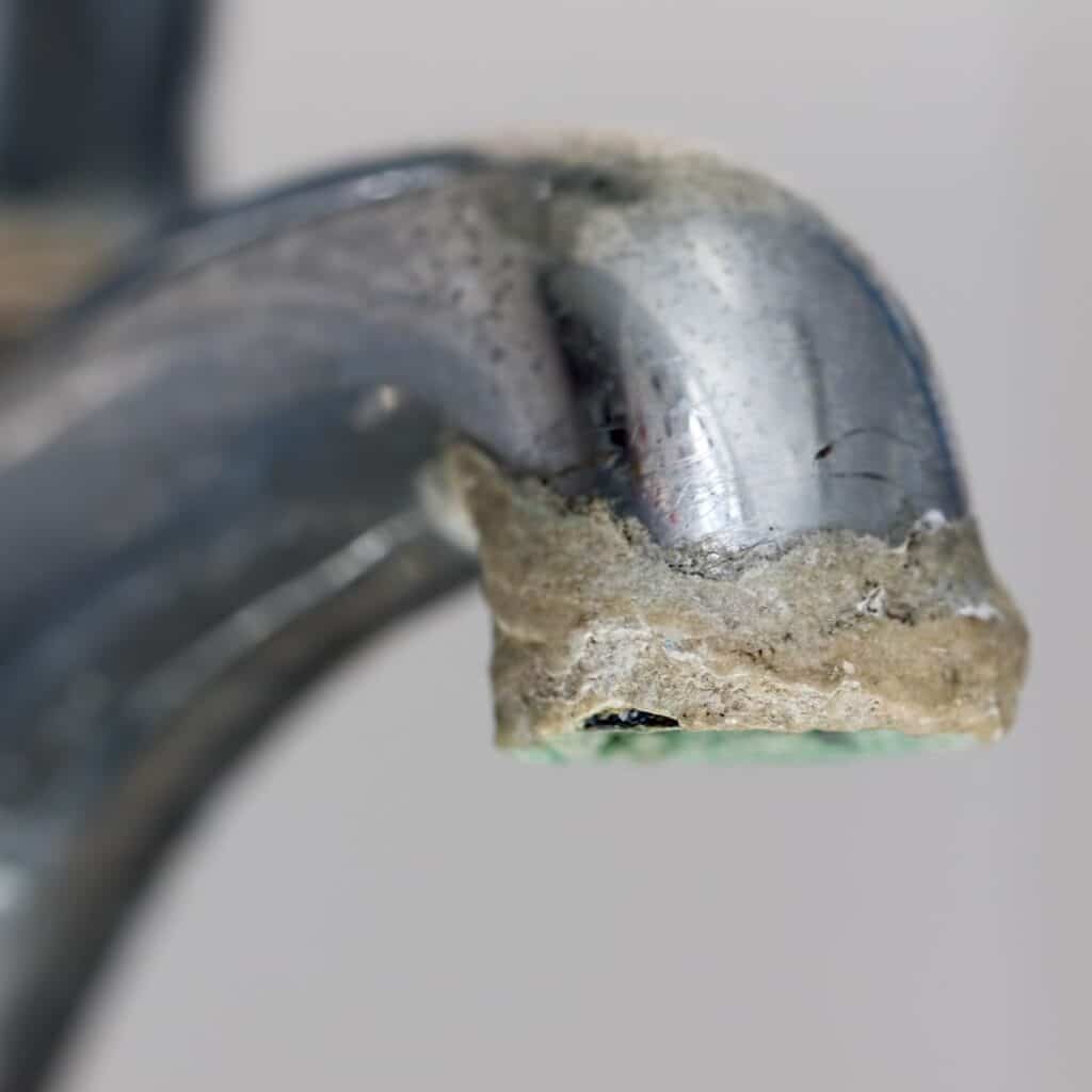 hard water build up on a faucet