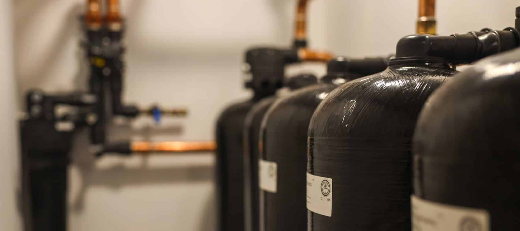 water softening tanks lined up