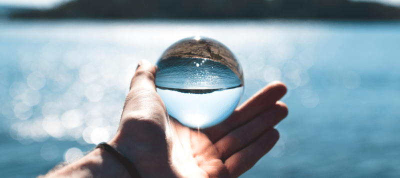 hand holding water droplet